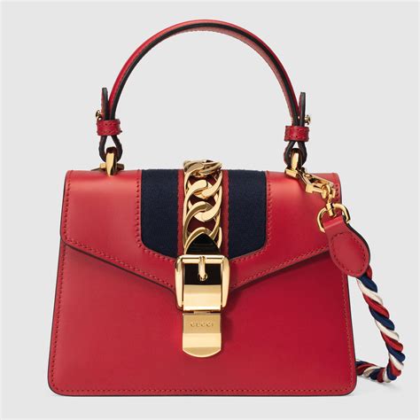 passamaneria blu rossa gucci|gucci red handbags.